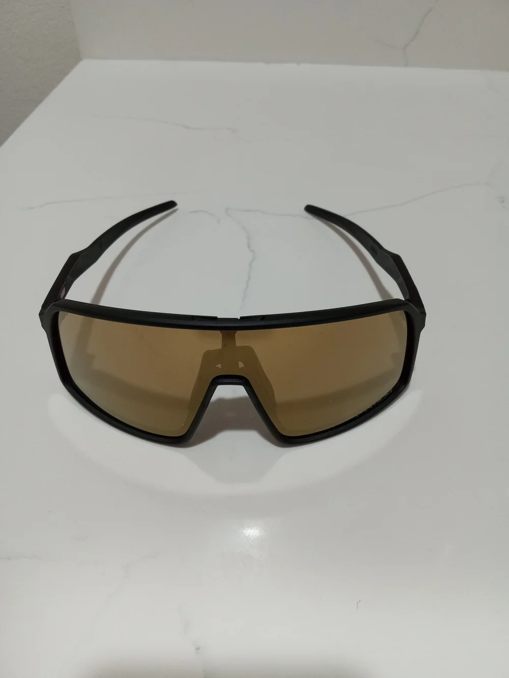 Oakley Black Frame Sunglasses with Brown Lenses